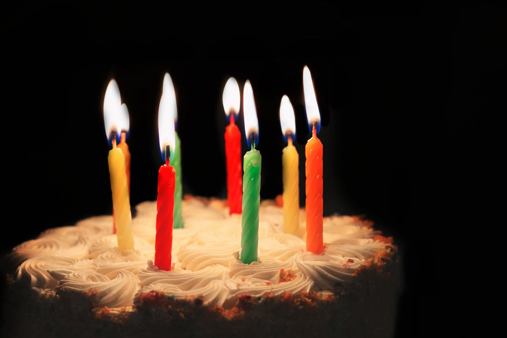 Birthday cake with candles made by Mitho Bakery