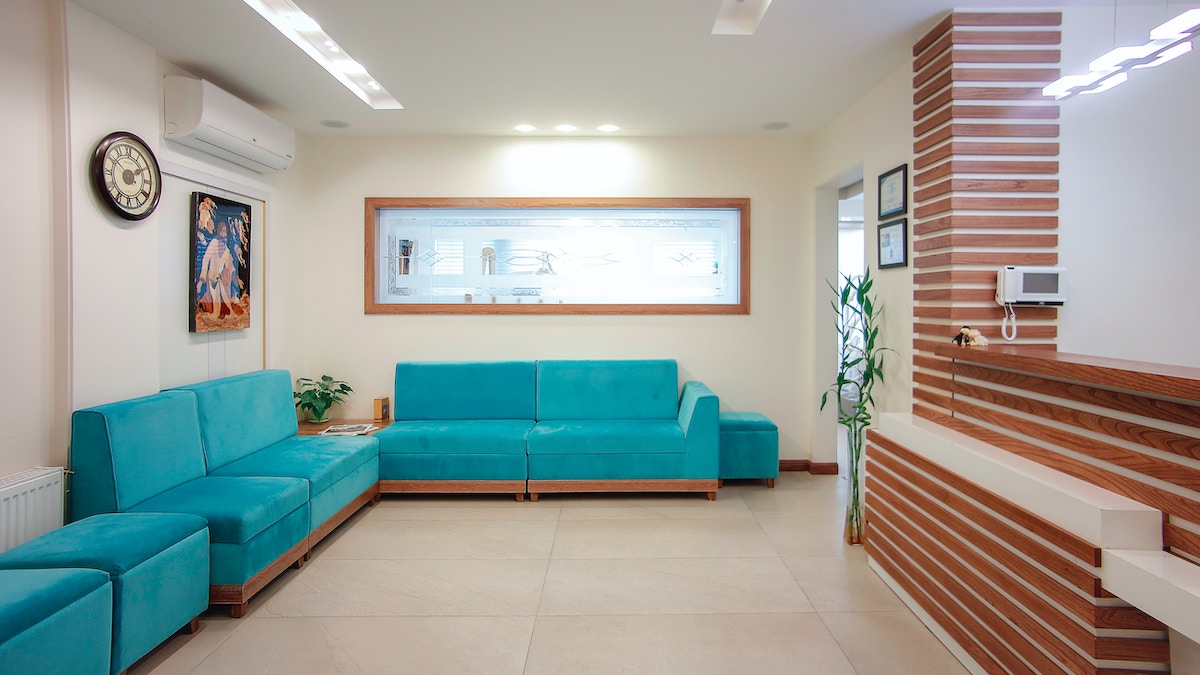 BrightPath reception and waiting lounge with teal seating